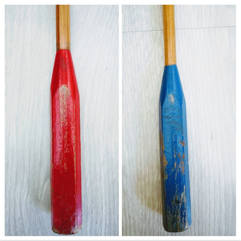 Pair of old wooden badminton rackets