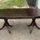 Table with two extensions and 6 mahogany chairs from the 19th century.