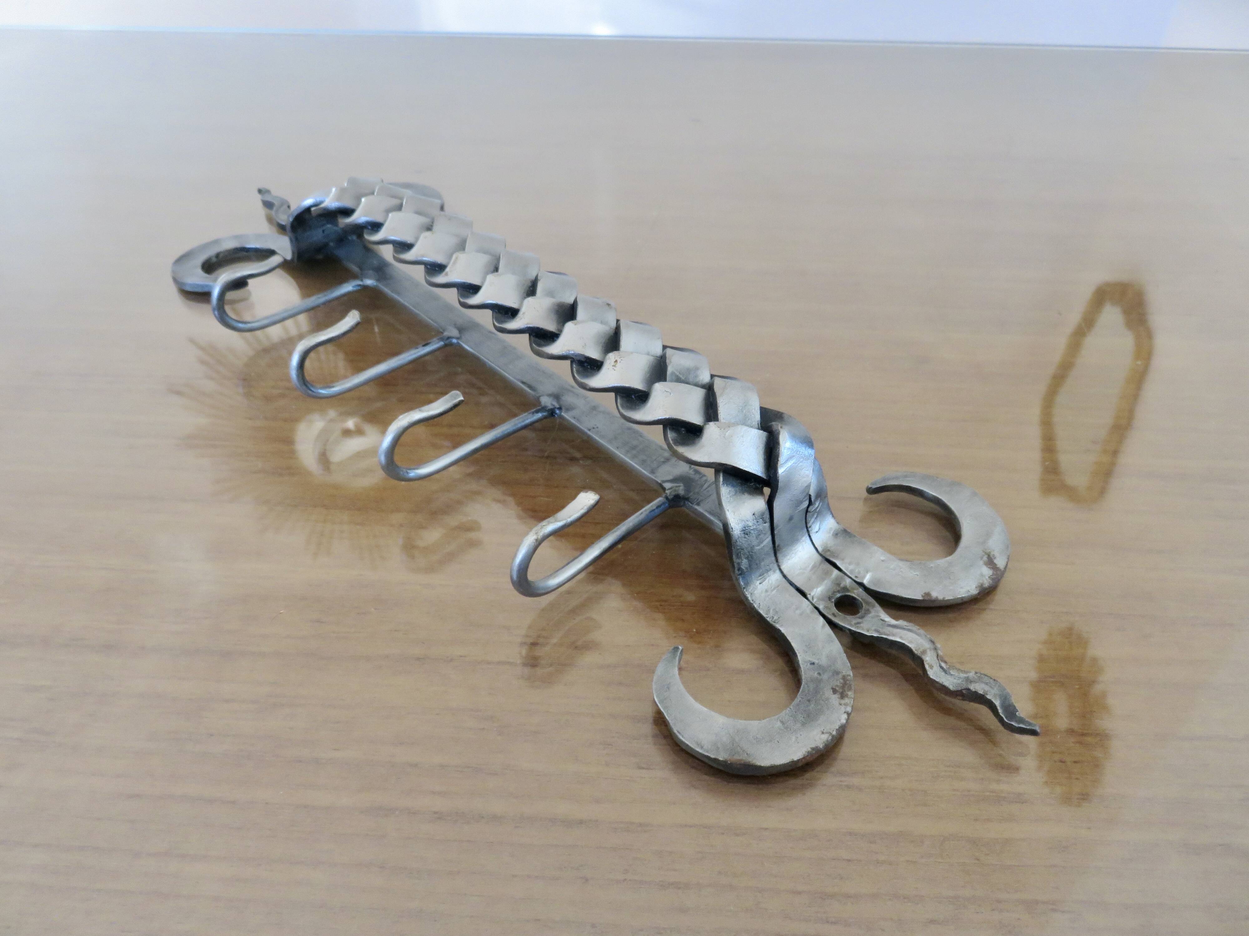 2 Tea towel holders, ironwork in braided raw steel, 1970