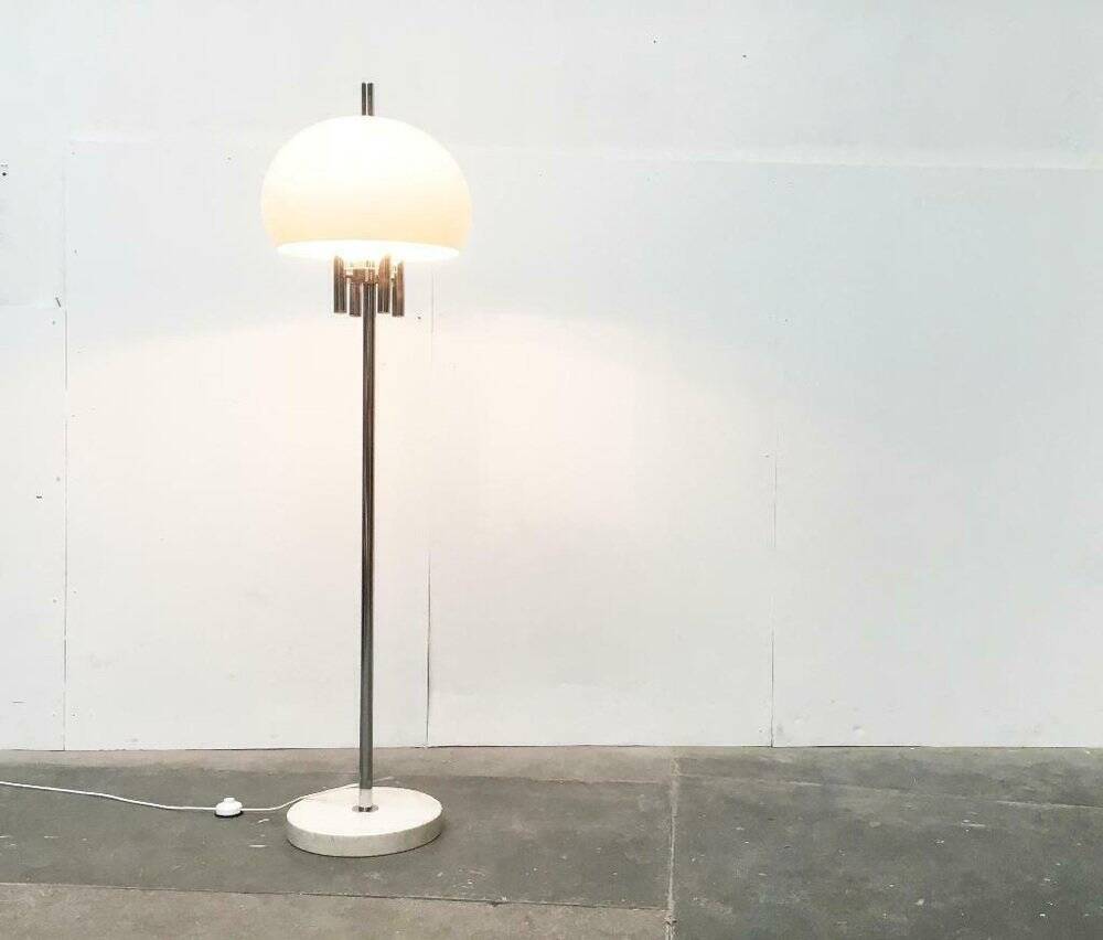 Italian space-style floor lamp from the 1960s with a stone base.