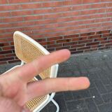 Cesca dining room chair designed by Marcel Breuer