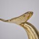 Solid brass dolphin console feet.