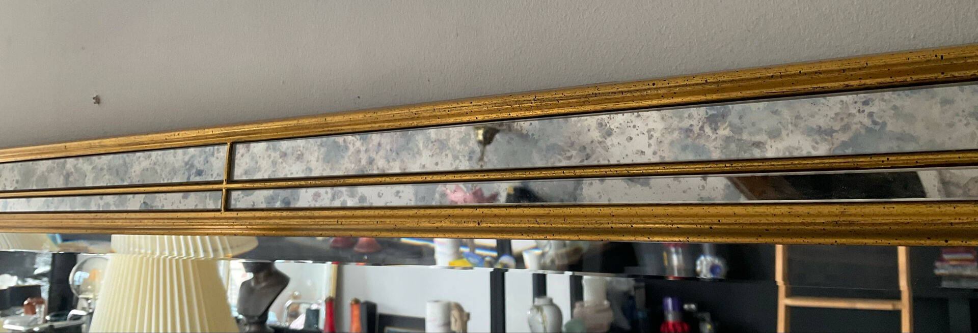 Large gold mirror by Deknudt with parcloses from the 1970s.