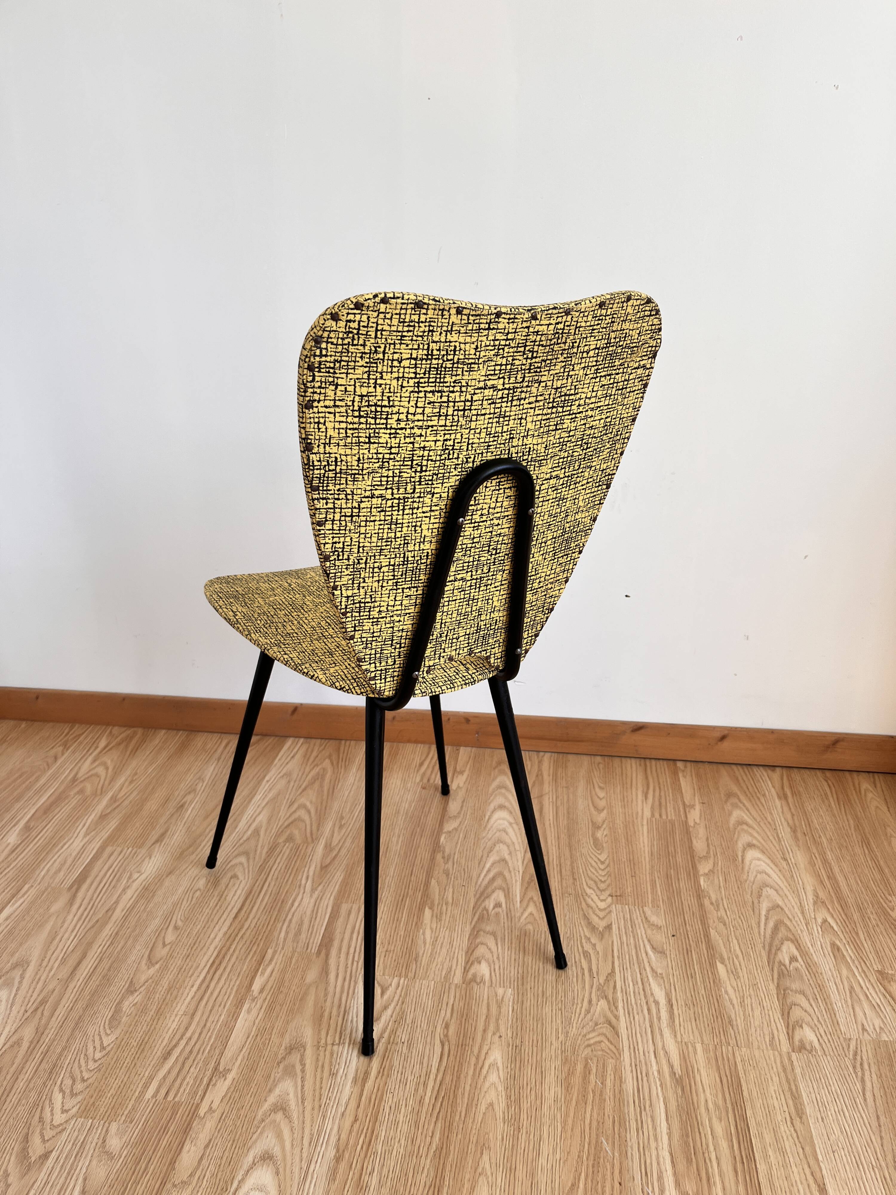 Faux leather chair assigned to Hitier.
