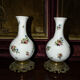 Pair of antique vases in hand-painted porcelain and bronze – Décor