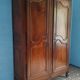 Large Louis XV style gendarme's hat-shaped wardrobe