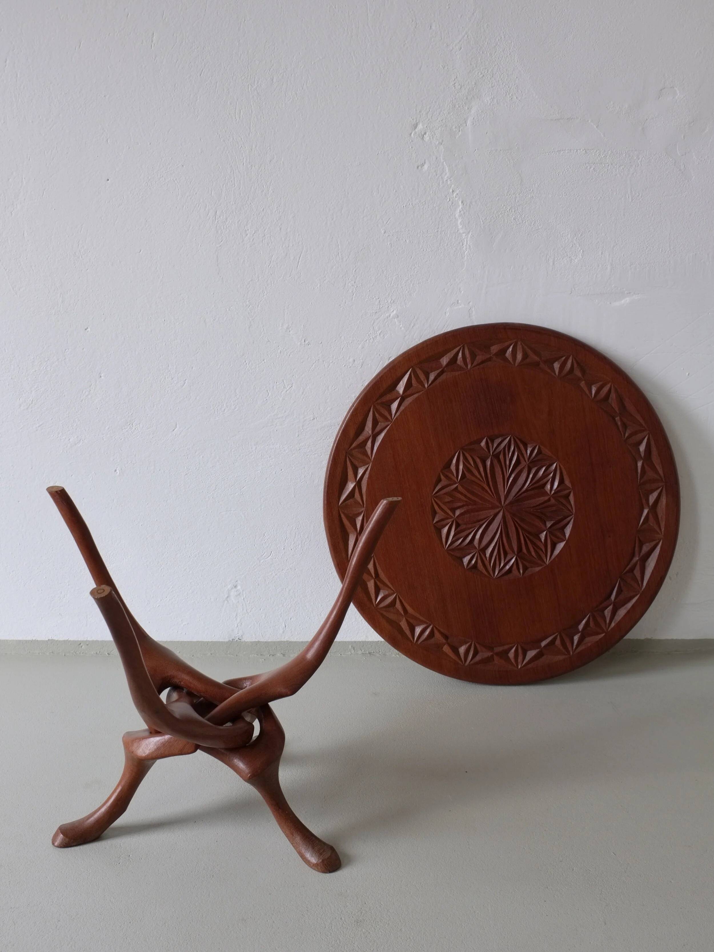 Sculptural carved teak side table | 1960s
