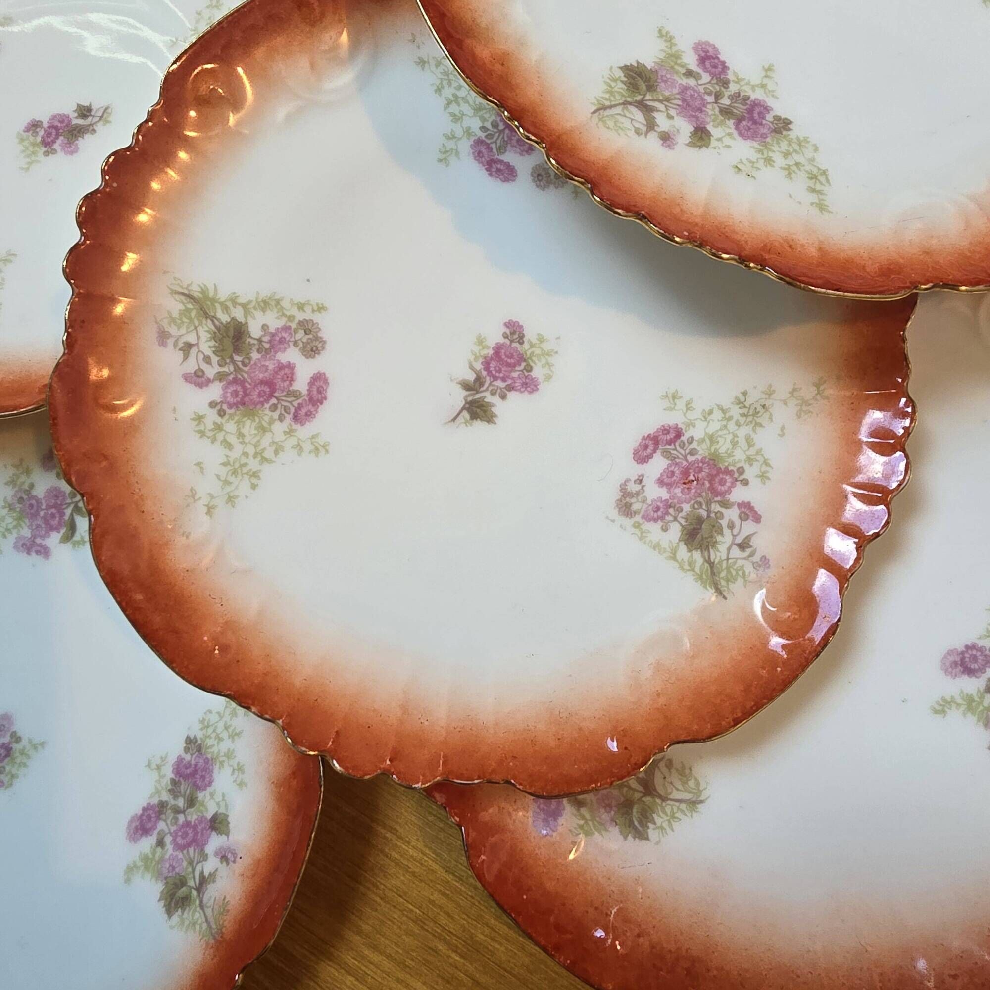10 scalloped plates in French porcelain