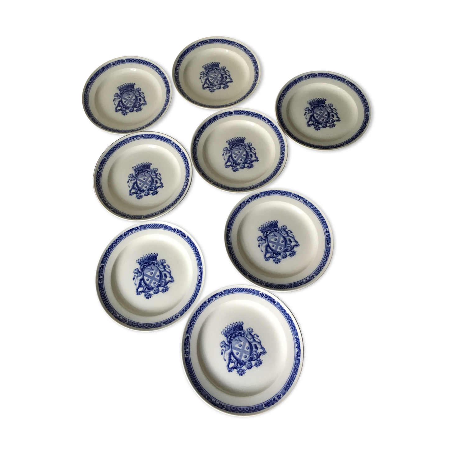 Eight plates with arms Creil and Montereau early 20th