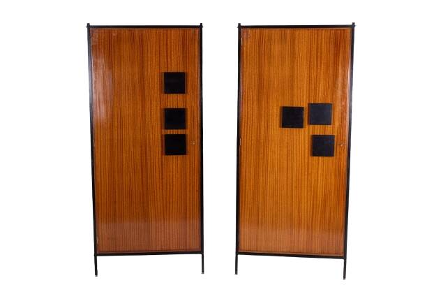 Pair of mahogany veneer and black lacquered iron cabinets. 1950s.
