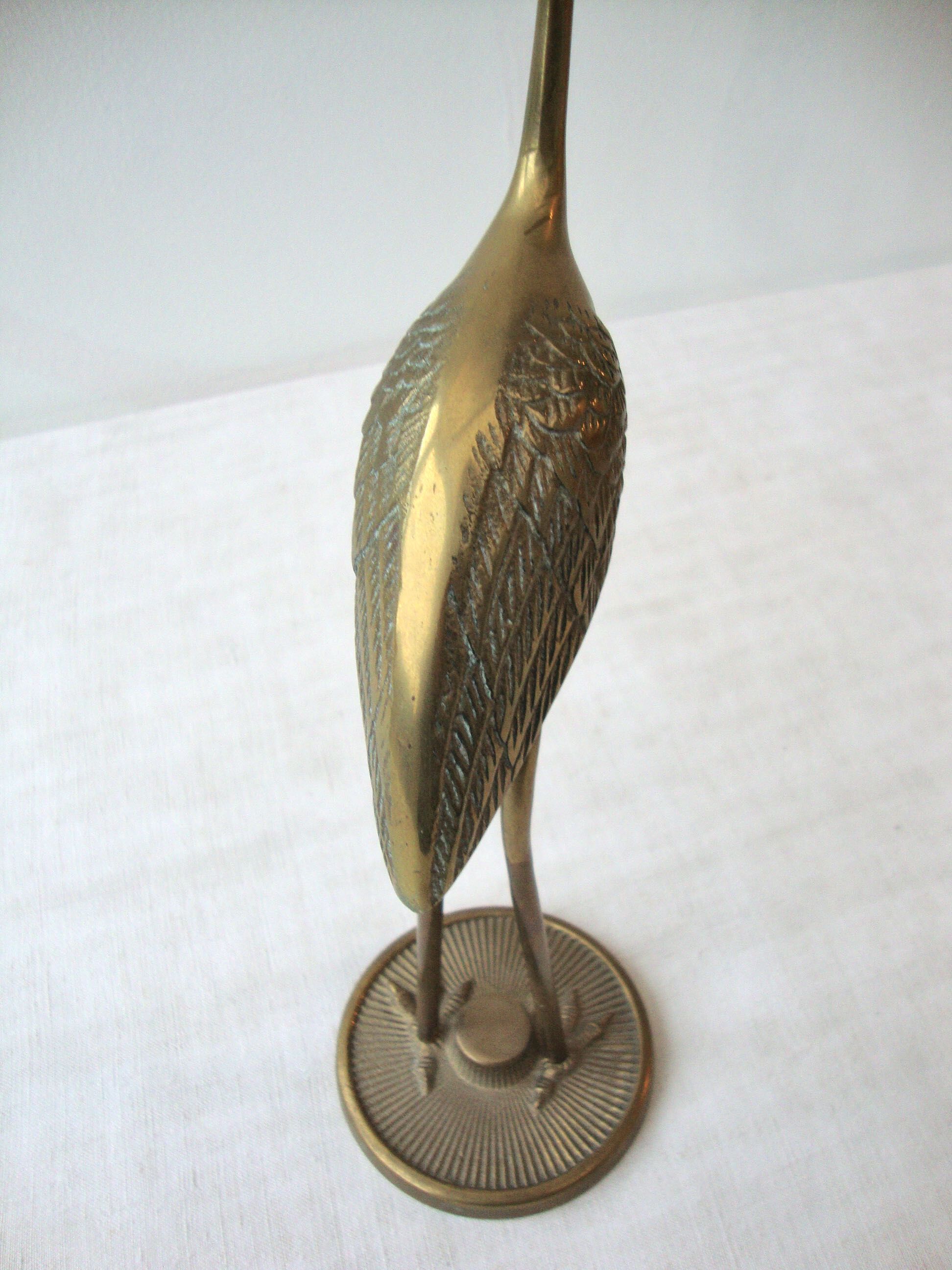 Brass heron