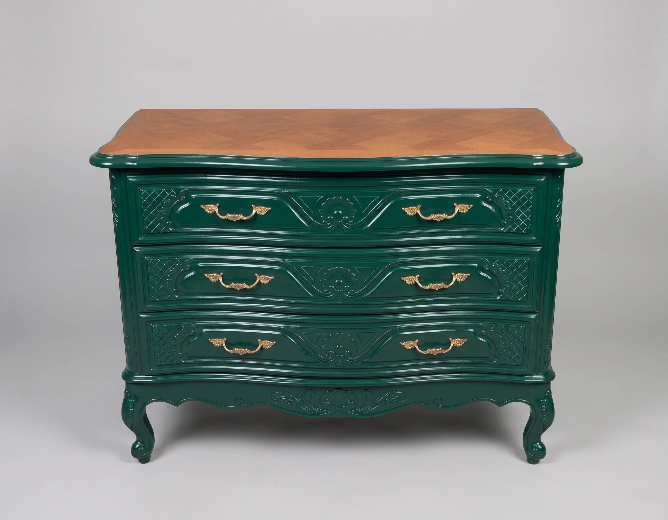 Restored cherry wood chest of drawers in English green.