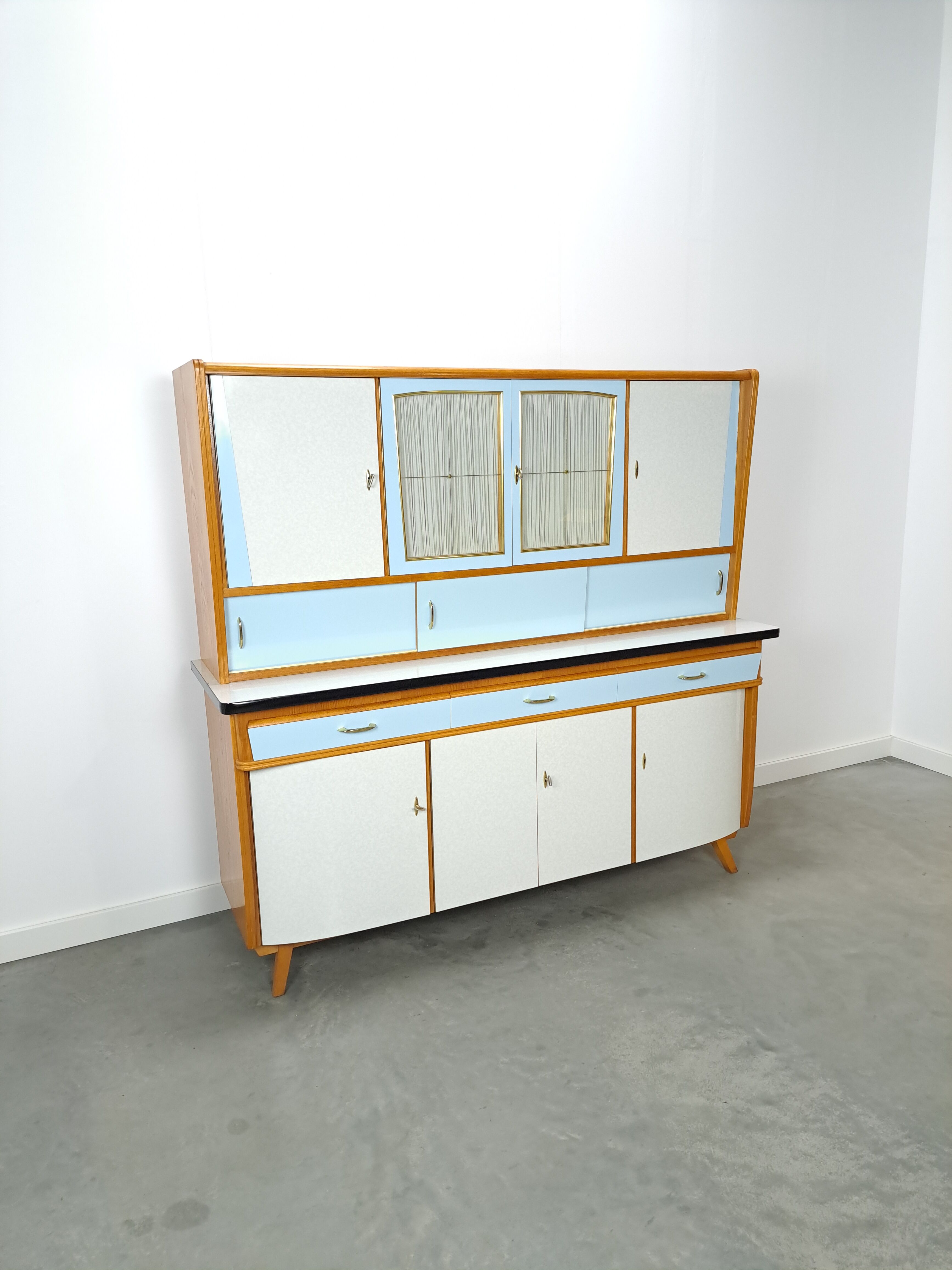 50s vintage kitchen cabinet with brass and formica