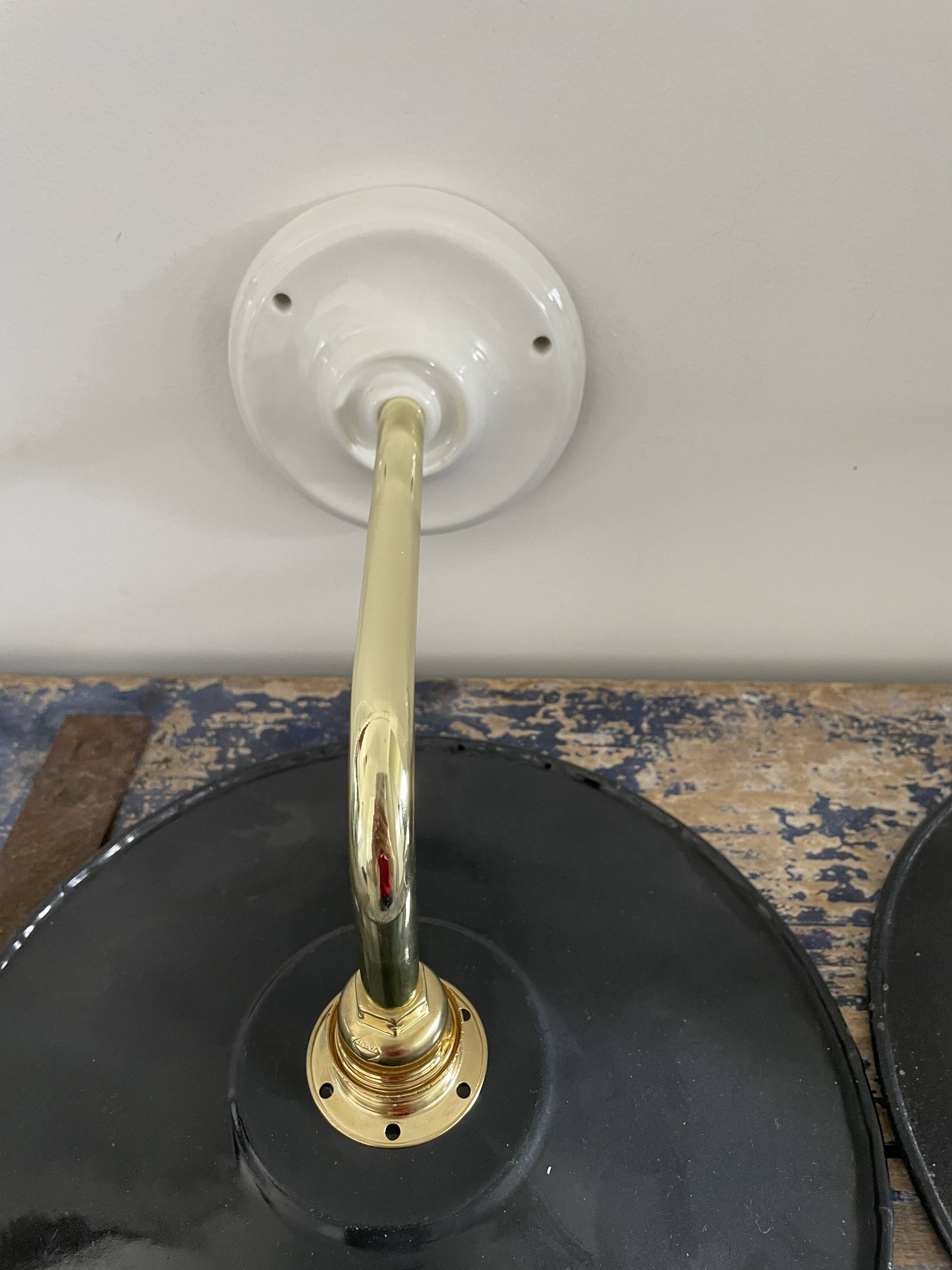 Pair of black enamelled sheet metal wall lamps electrified to nine
