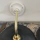 Pair of black enamelled sheet metal wall lamps electrified to nine