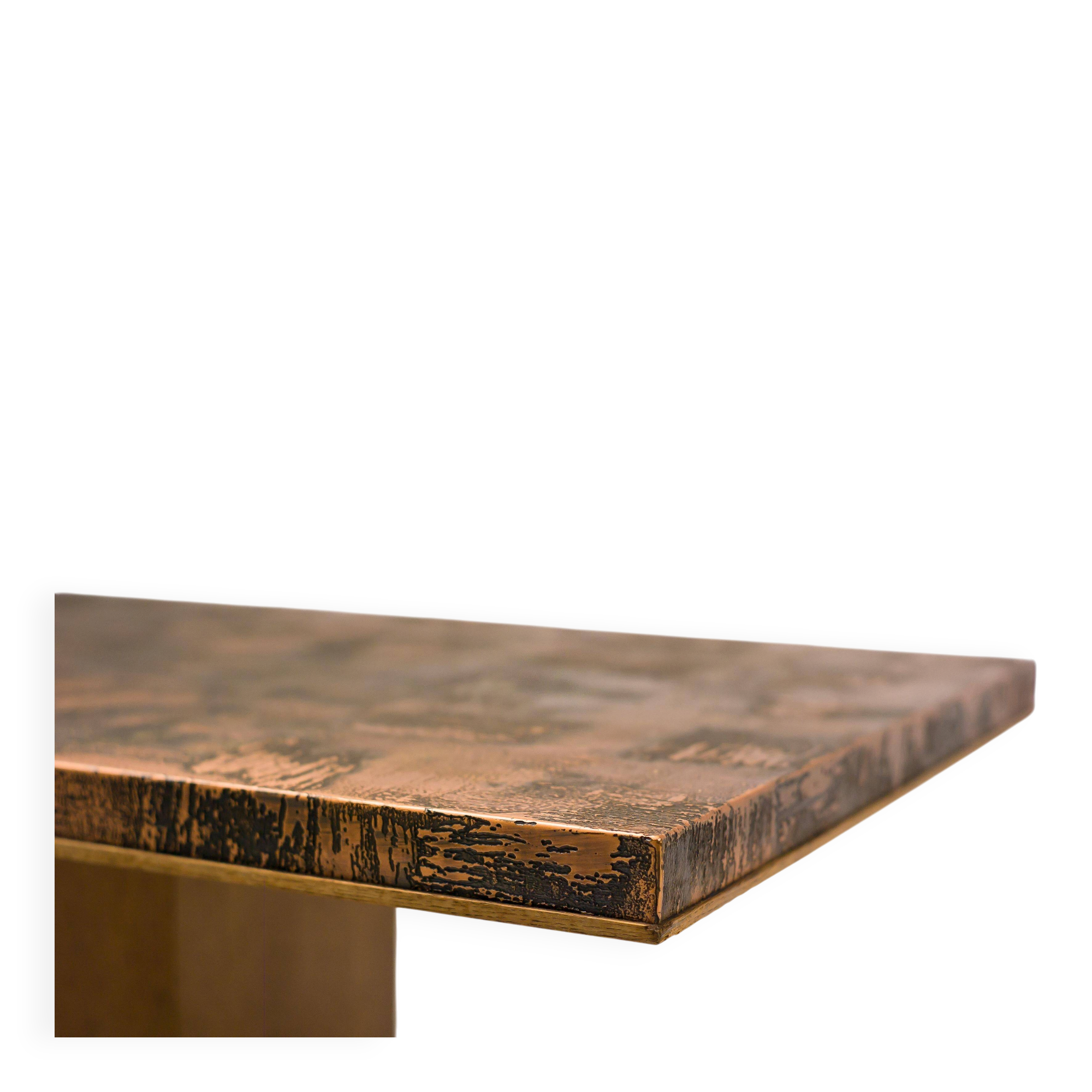 Coffee table with a pressed and engraved brass top by Illum Wikkelsø.
