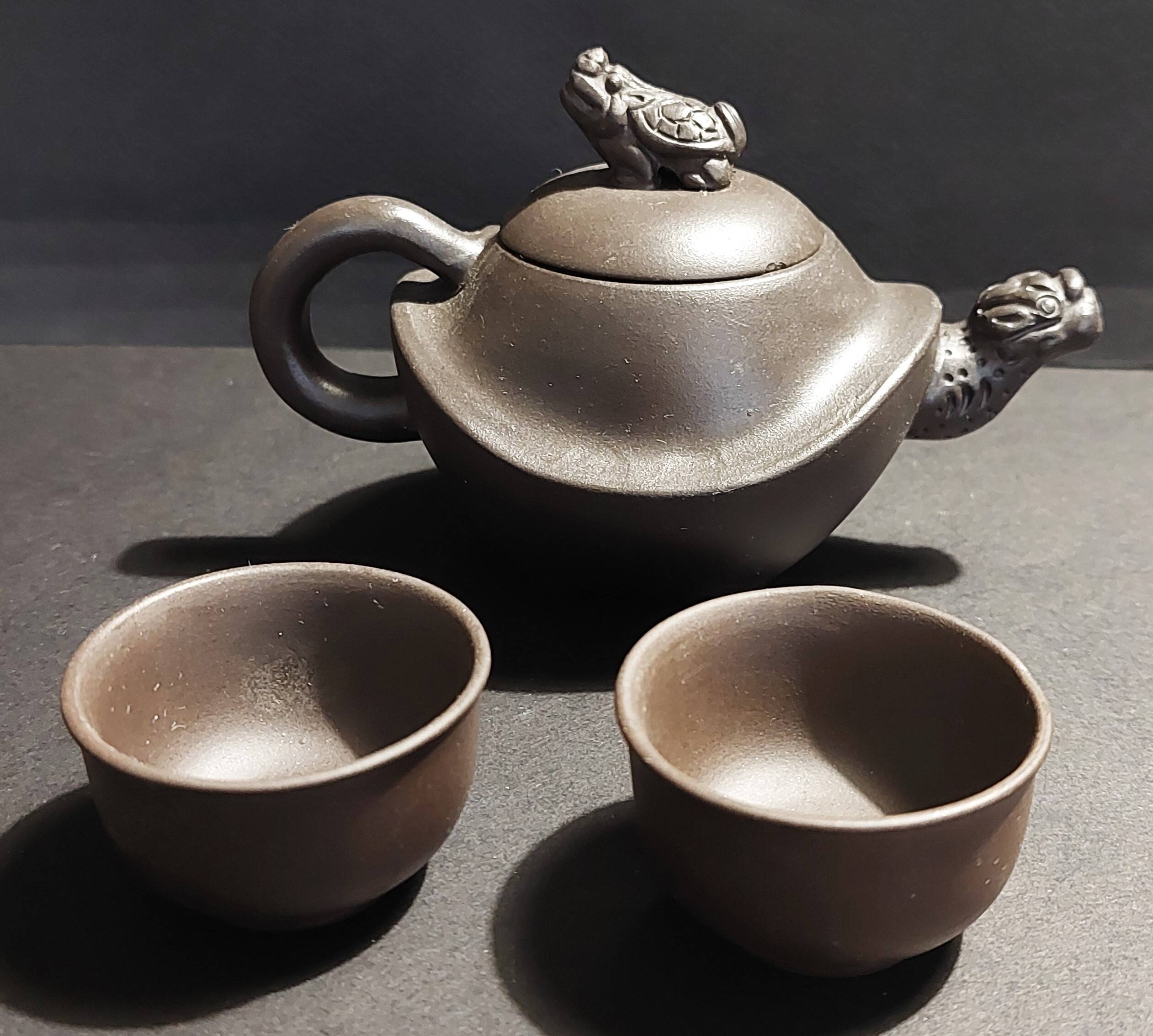 China Yixing terracotta teapot and bowls signed