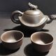 China Yixing terracotta teapot and bowls signed