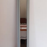 Old mirror patinated green of gray