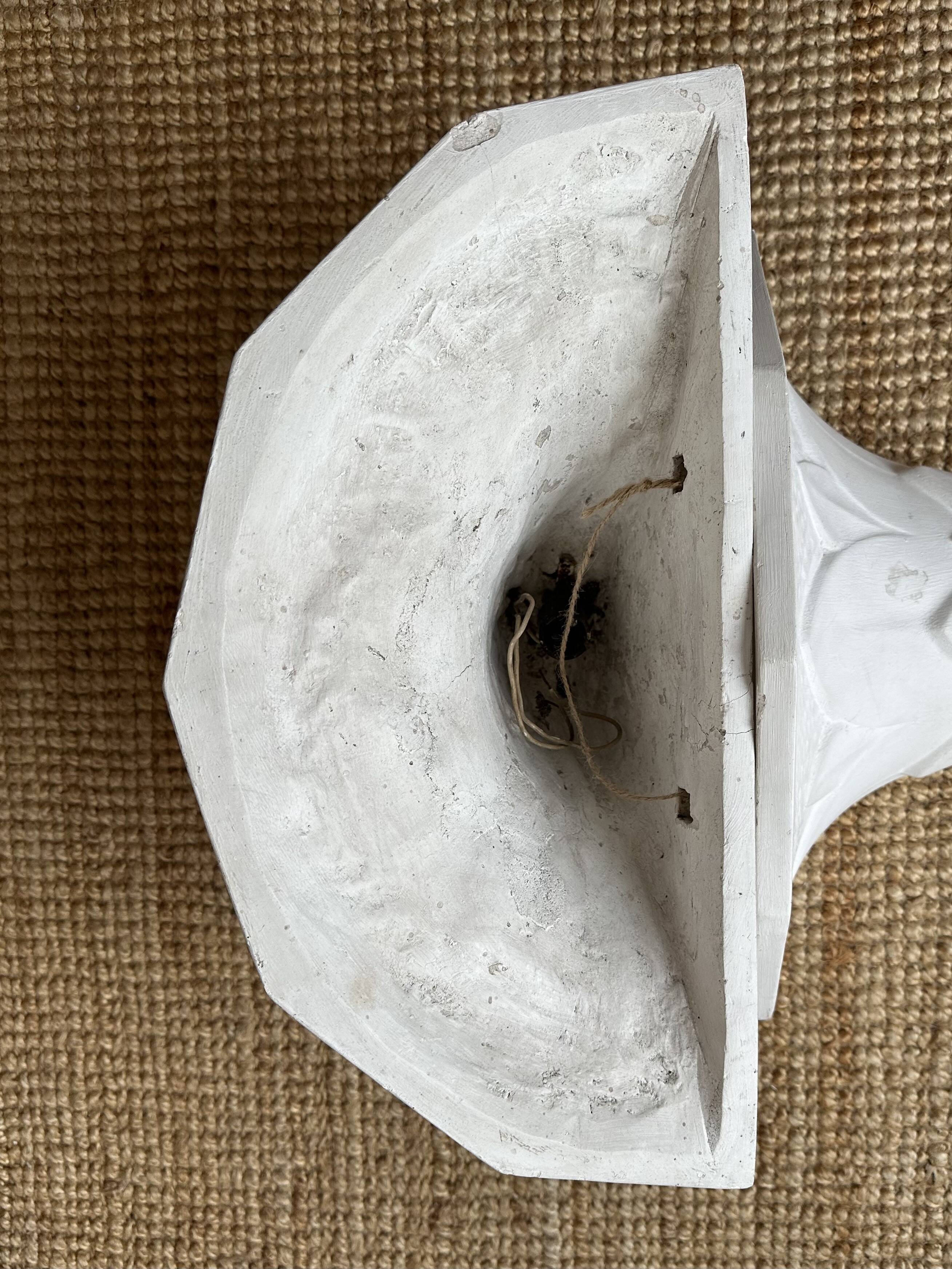 Pair of plaster wall sconces, palmette decoration, 20th century