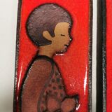 Long Søholm relief in beautiful red glaze with a motif of a girl and a boy