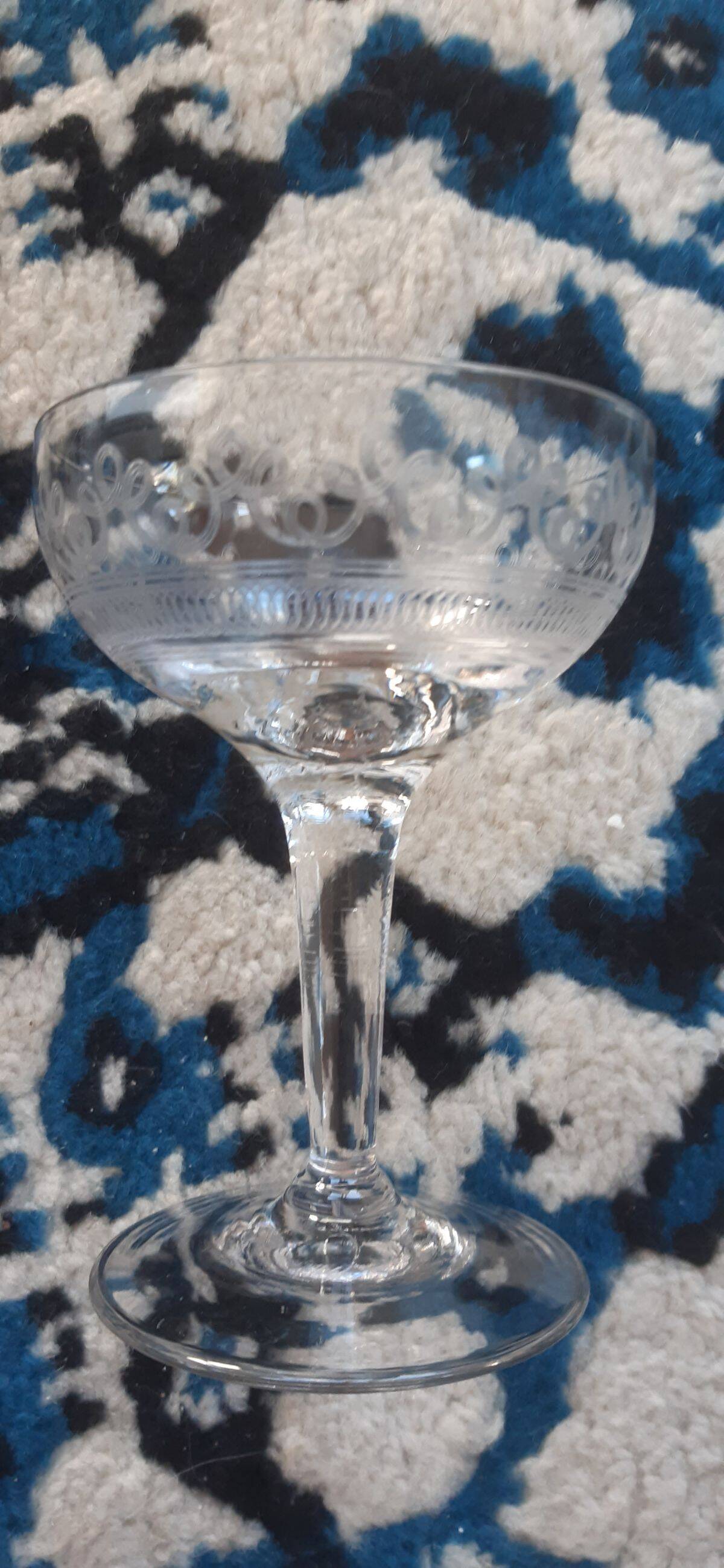 Ten champagne coupes from the Belle Époque.