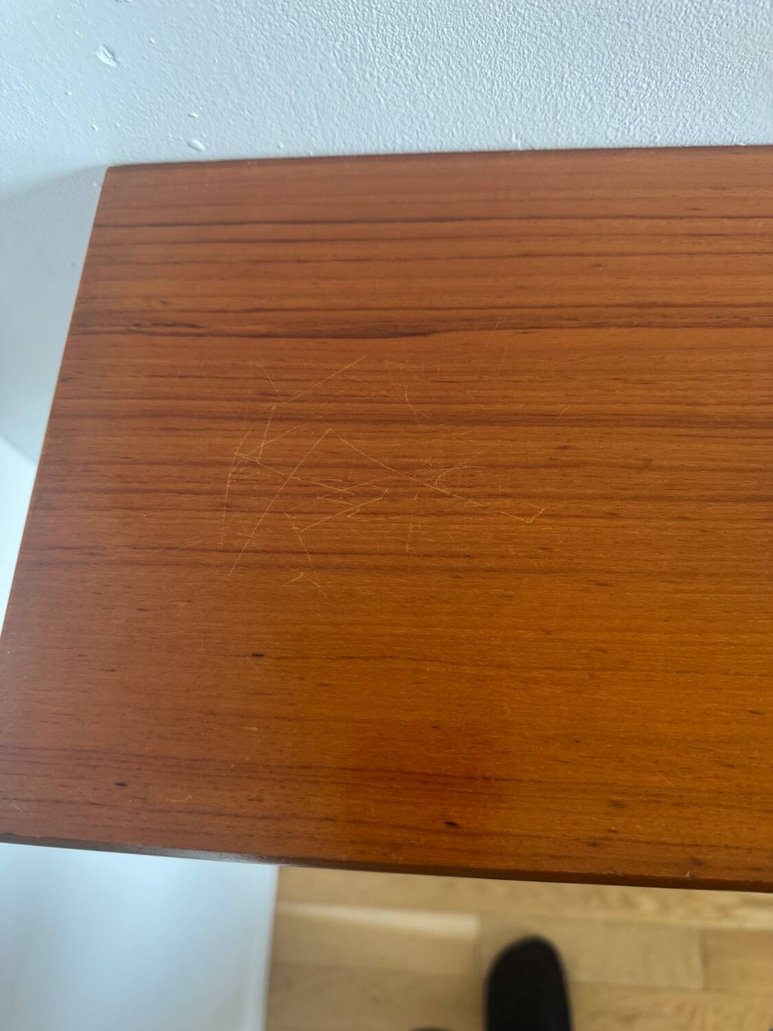 Vintage Scandinavian teak wall-mounted bedside tables.