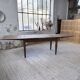 Solid oak farmhouse table with integrated extensions 1950