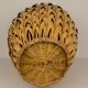 Rattan vase and braided bamboo leaves
