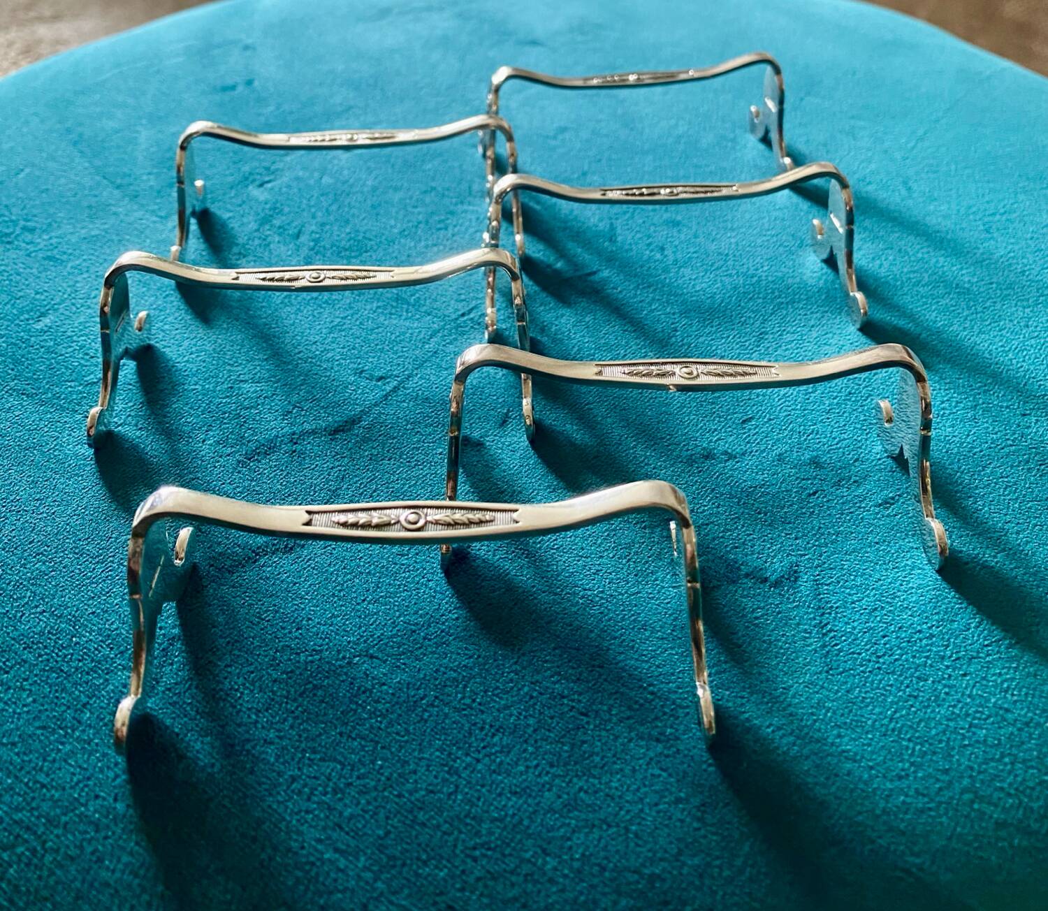 6 Christofle silver-plated metal knife rests