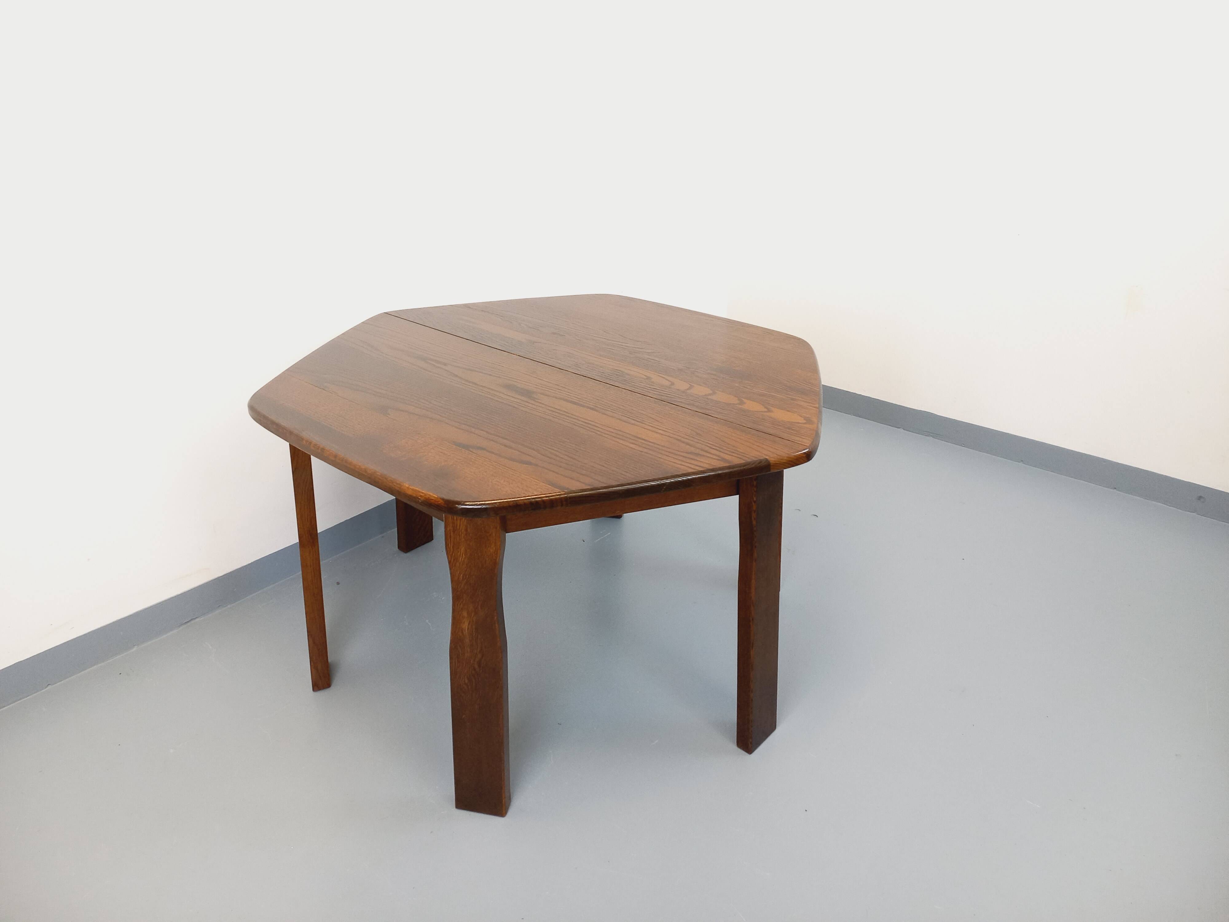 Vintage brutalist hexagonal dining table made of oak from the 1950s.
