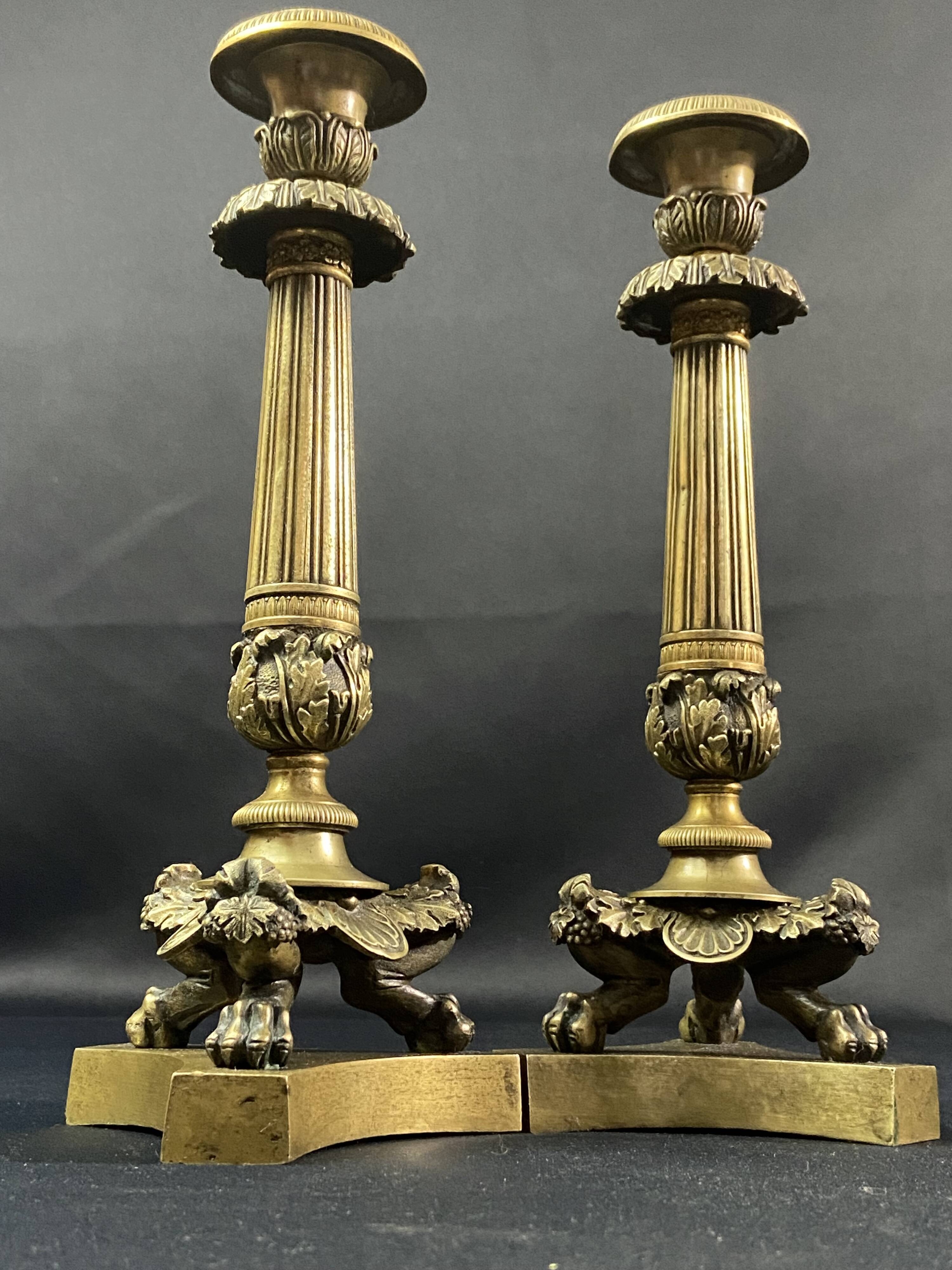 Pair of gilt and chiseled bronze candlesticks from the Restoration period