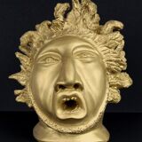 Head plaster gold paint