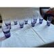 9 short glasses in purple glass