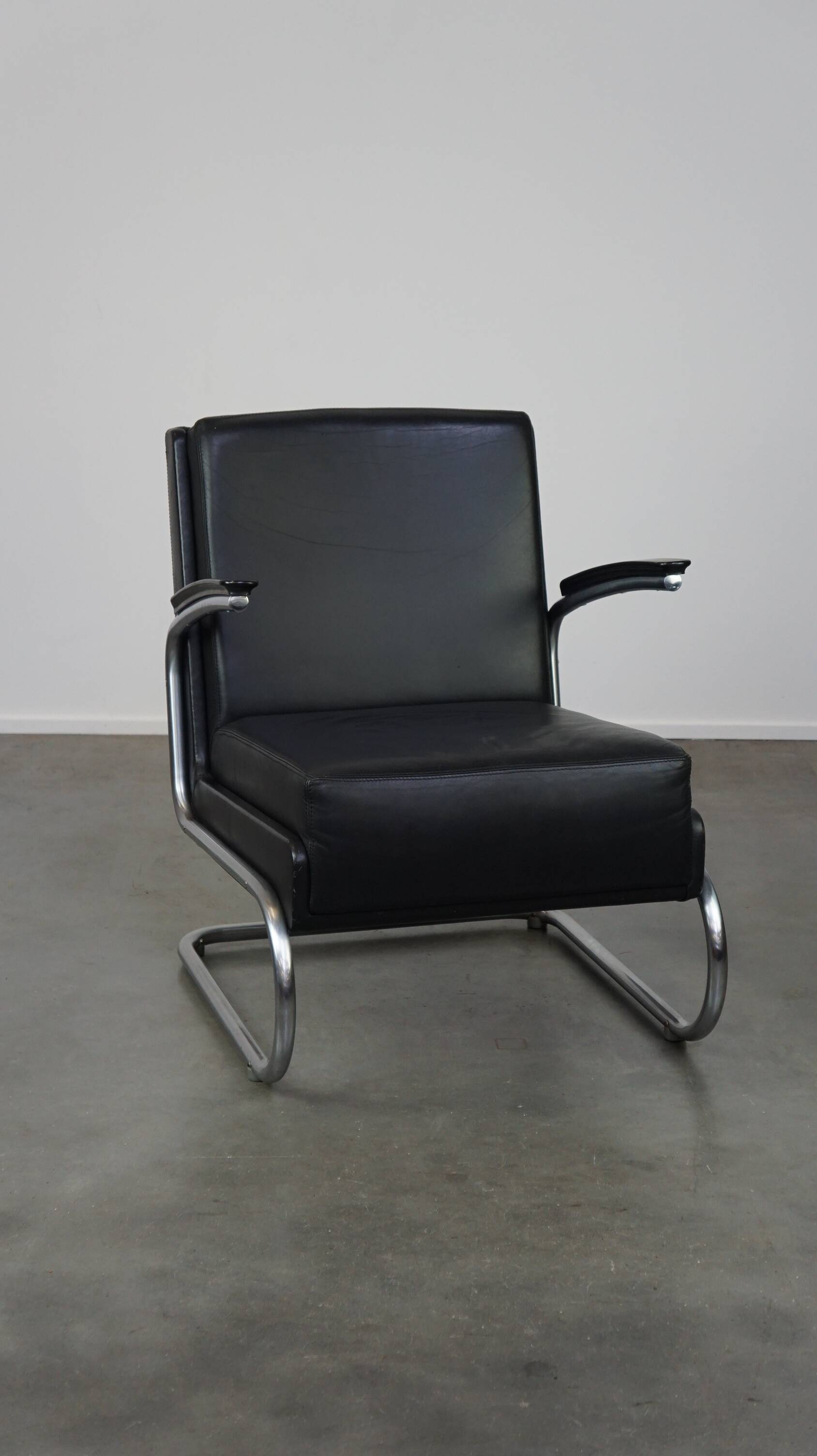 Vintage brown leather Bauhaus design armchair by Ahrend de Cirkel from the 1950s