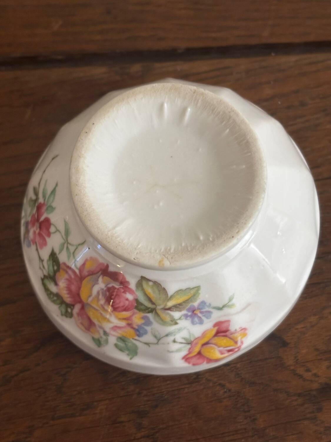 Vintage small antique bowl with floral decoration.