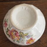 Vintage small antique bowl with floral decoration.