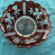 Red and transparent glass bowl with floral motifs and vintage wheat cobs