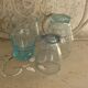 Liquor service consisting of a blue glass decanter and. 3 small antique glasses