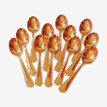 Golden metal teaspoon