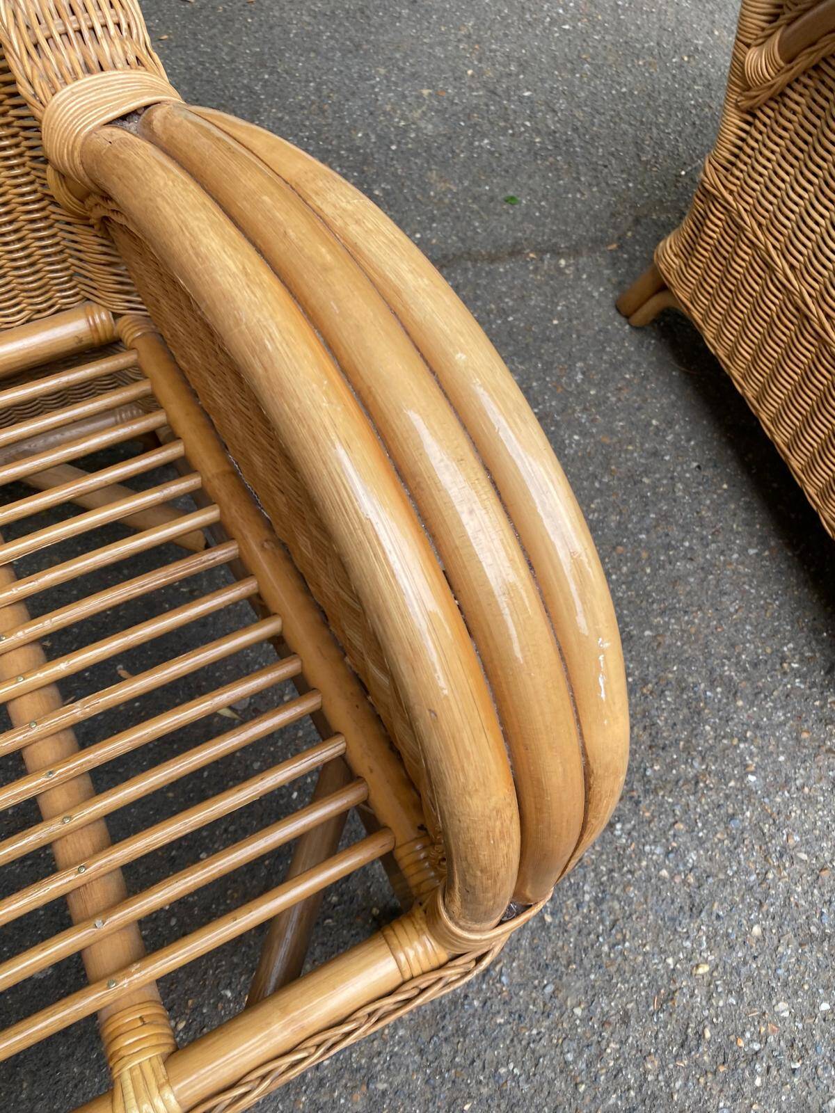 2 rattan and woven wicker armchairs in vintage 70s style
