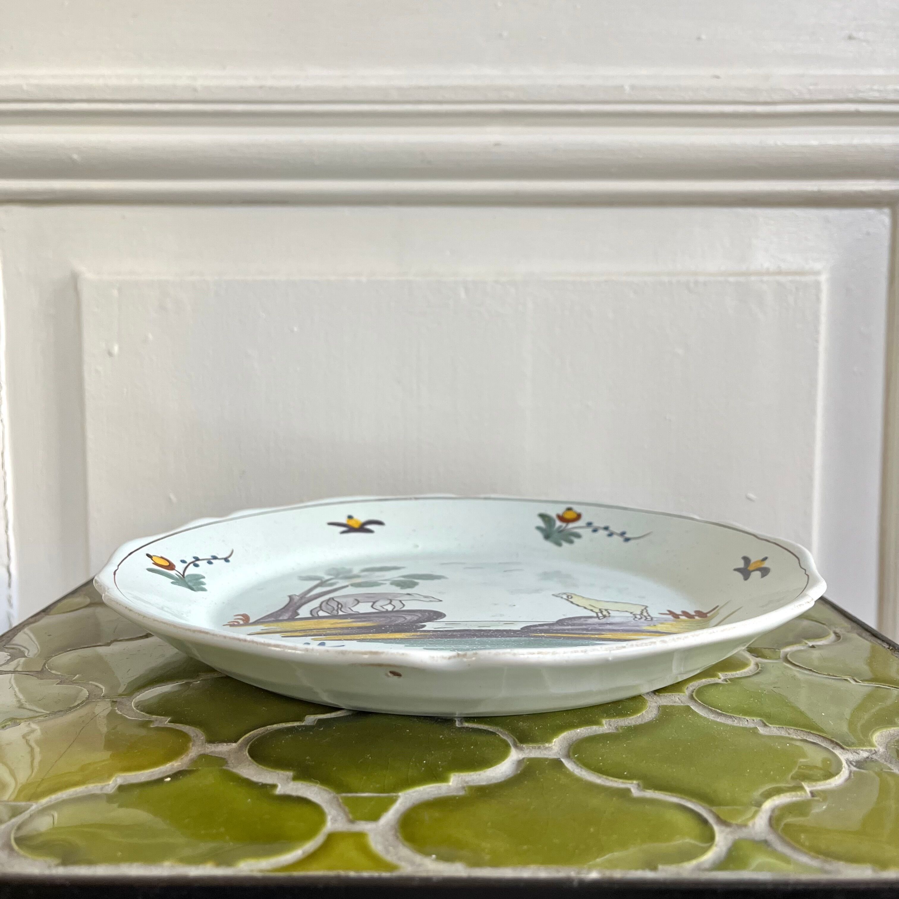 Decorative ceramic plate with "The Wolf and the Lamb" design