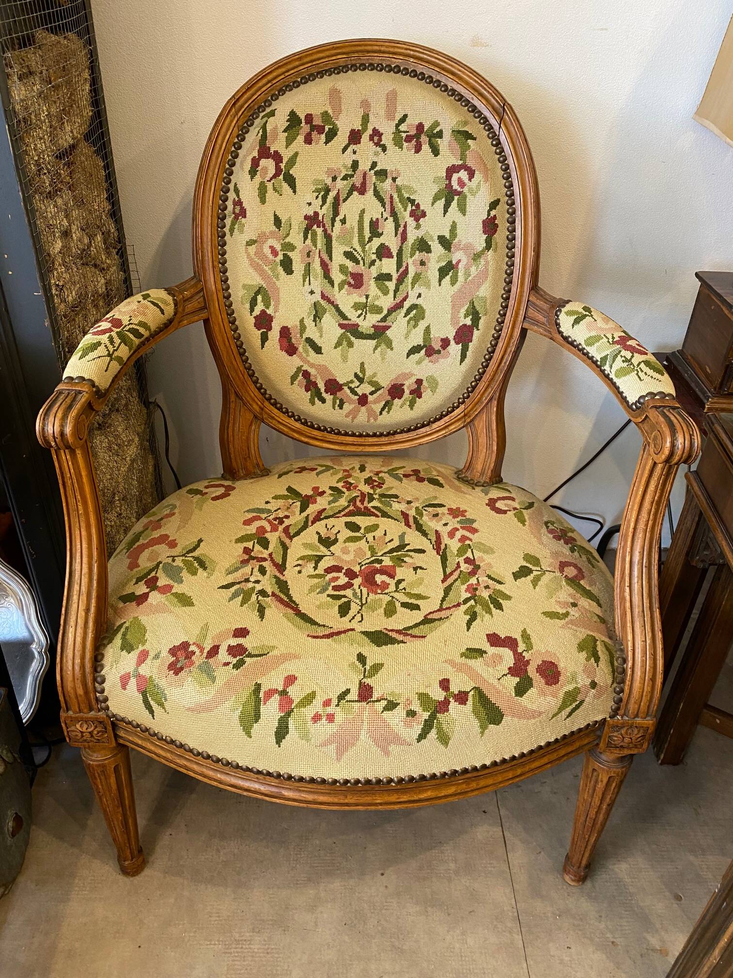 Louis XVI style medallion armchair with floral needlepoint tapestry