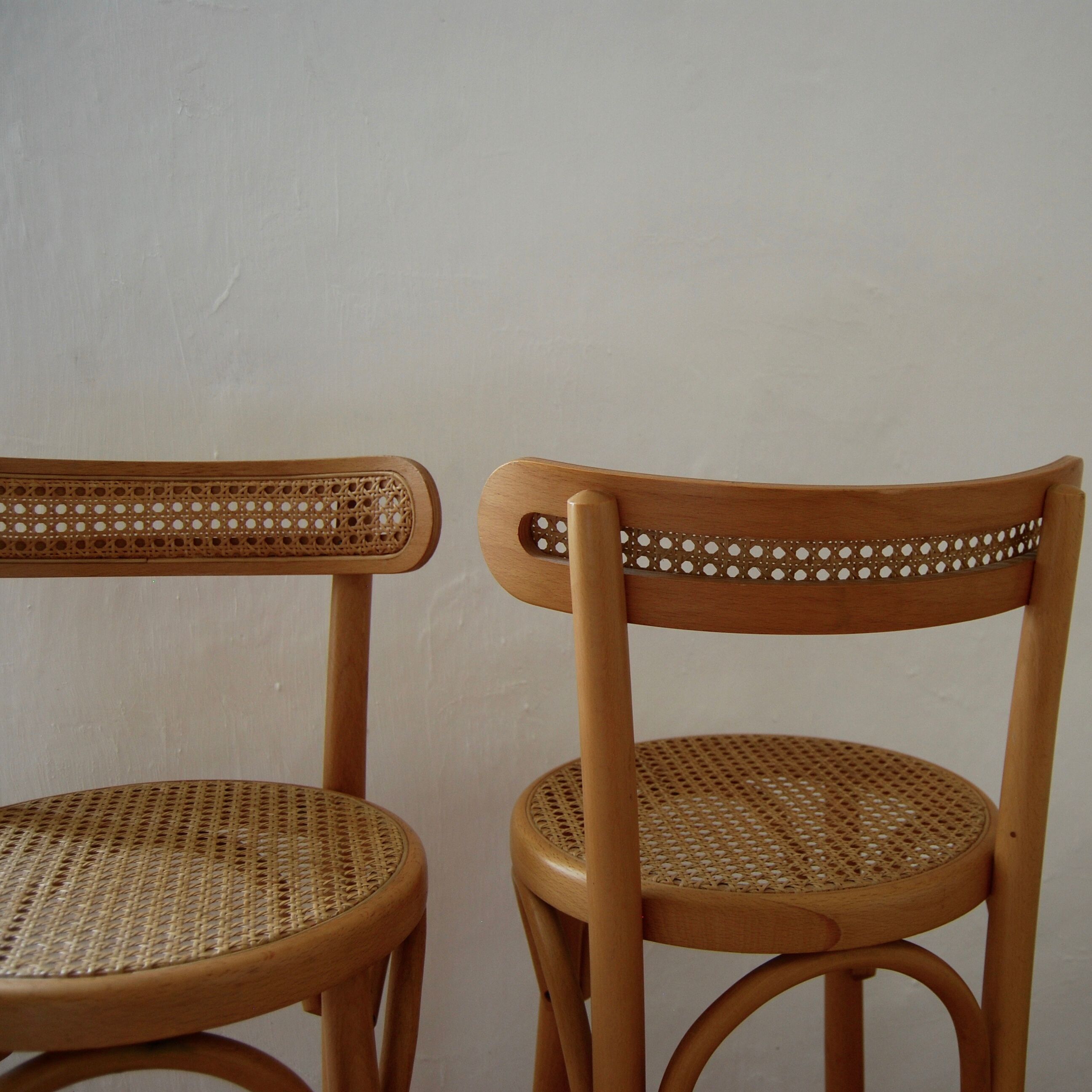 Wooden bar stools and cane