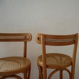 Wooden bar stools and cane