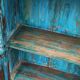 Old wooden cabinet with doors with grille