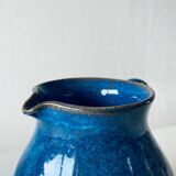 Old enamelled stoneware pitcher