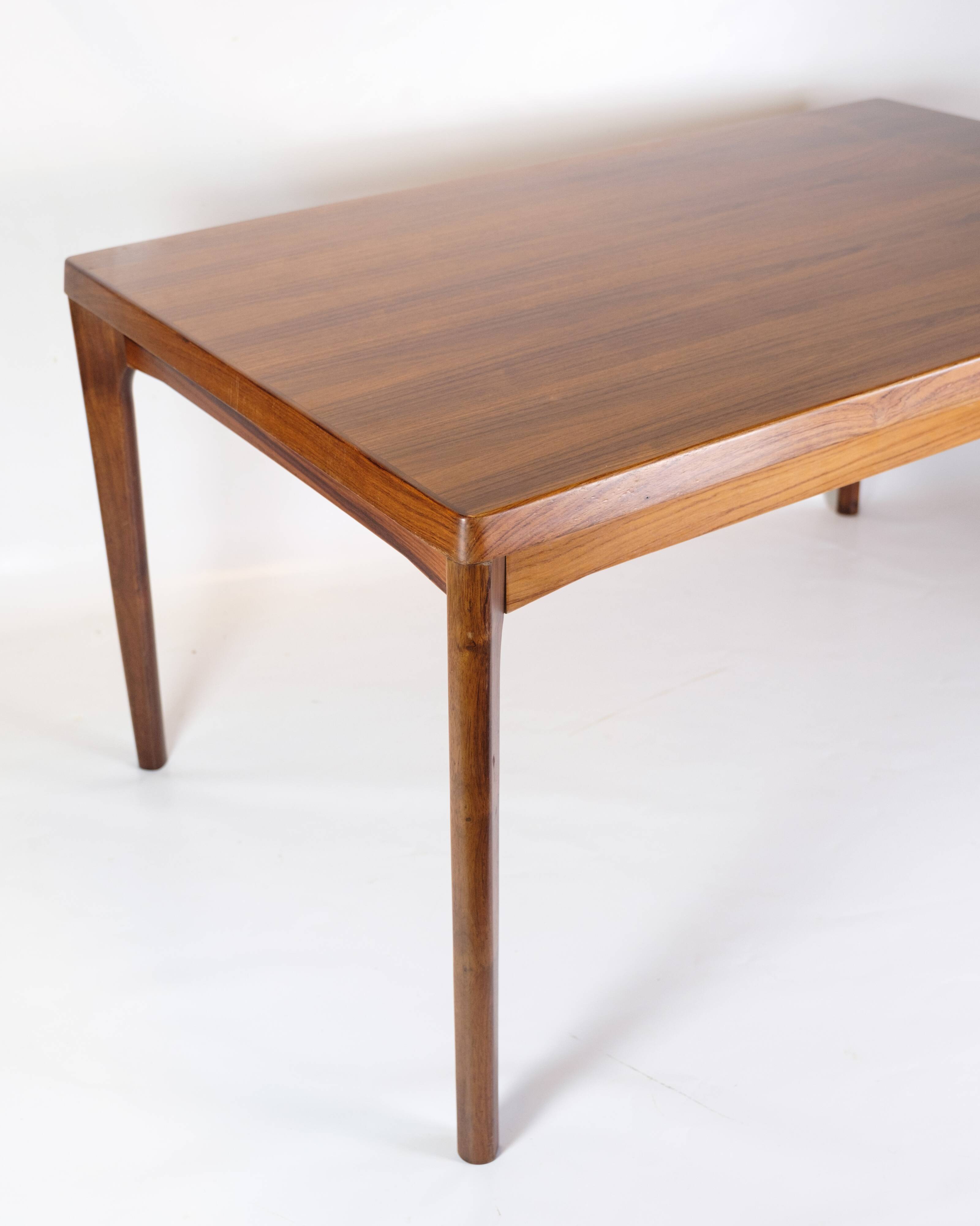 Dining Table With extensions Made In Rosewood By Henning Kjærnulf From 1960s