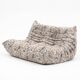 Pouf Togo et canapé 2 places tissu imprimé par Michel Ducaroy pour Ligne Roset