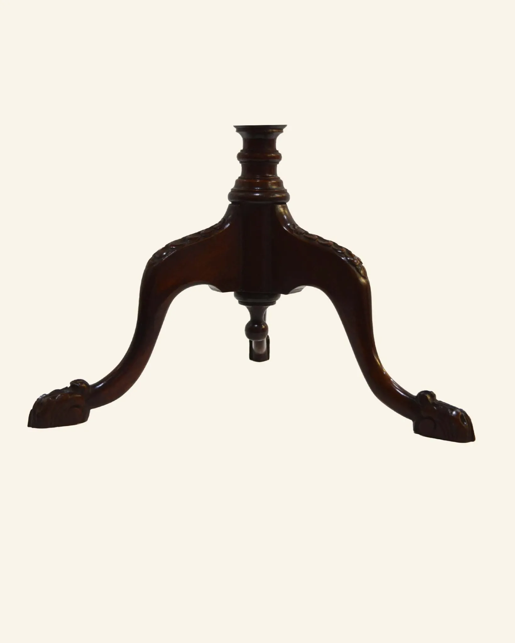 African mahogany guéridon, turned with a sculpted tripod leg.
